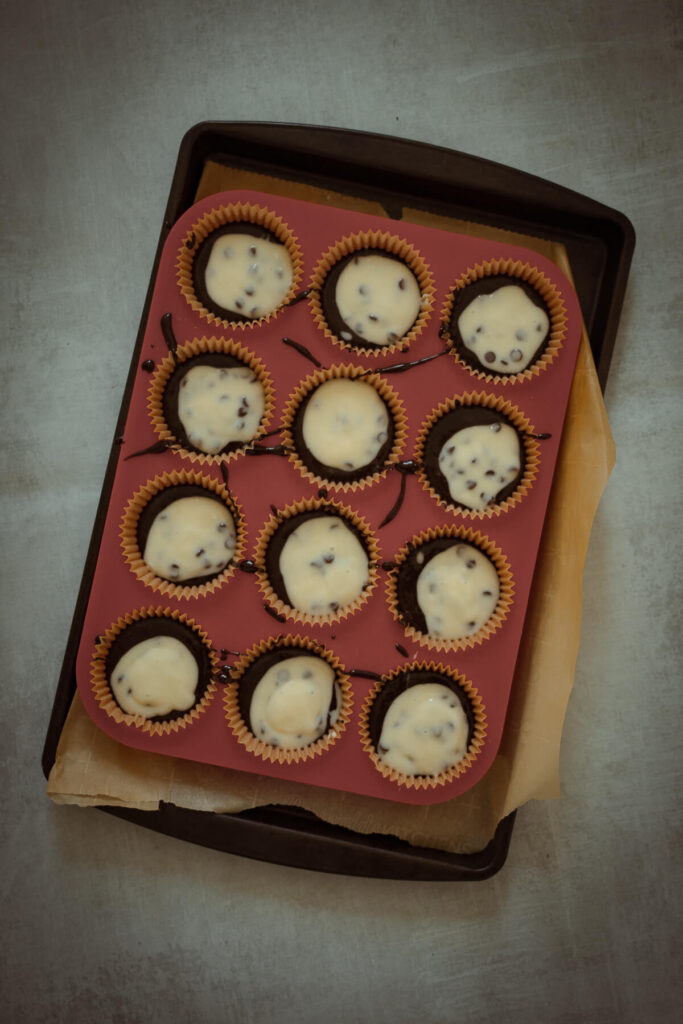 unbaked gluten free cream cheese cupcakes in muffin tin