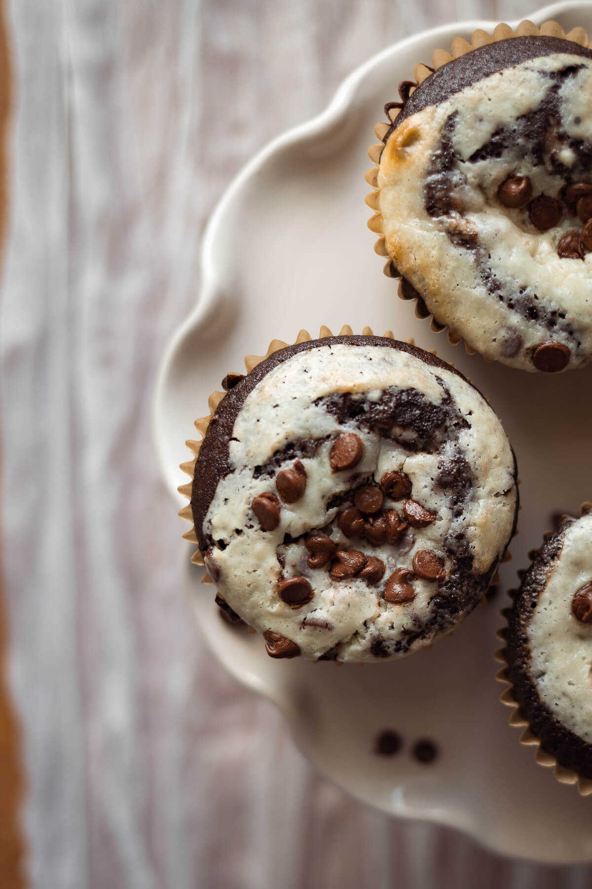 close up view of gluten free black bottom cupcakes