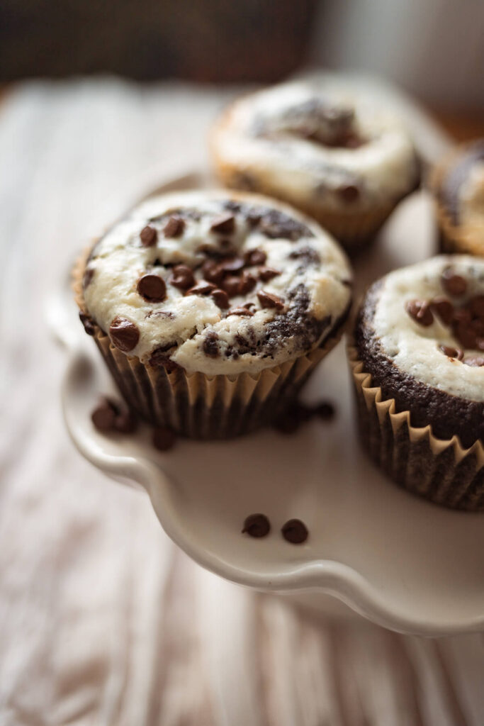 close up view of gluten free black bottom cupcakes