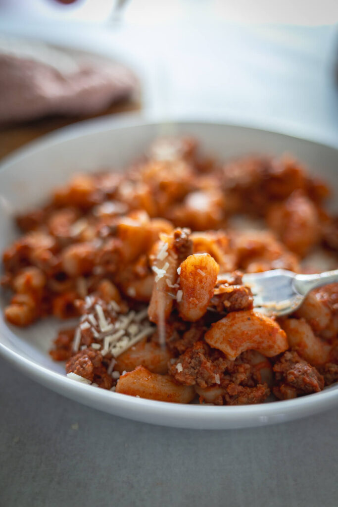 close up view of beefaroni in a bowl