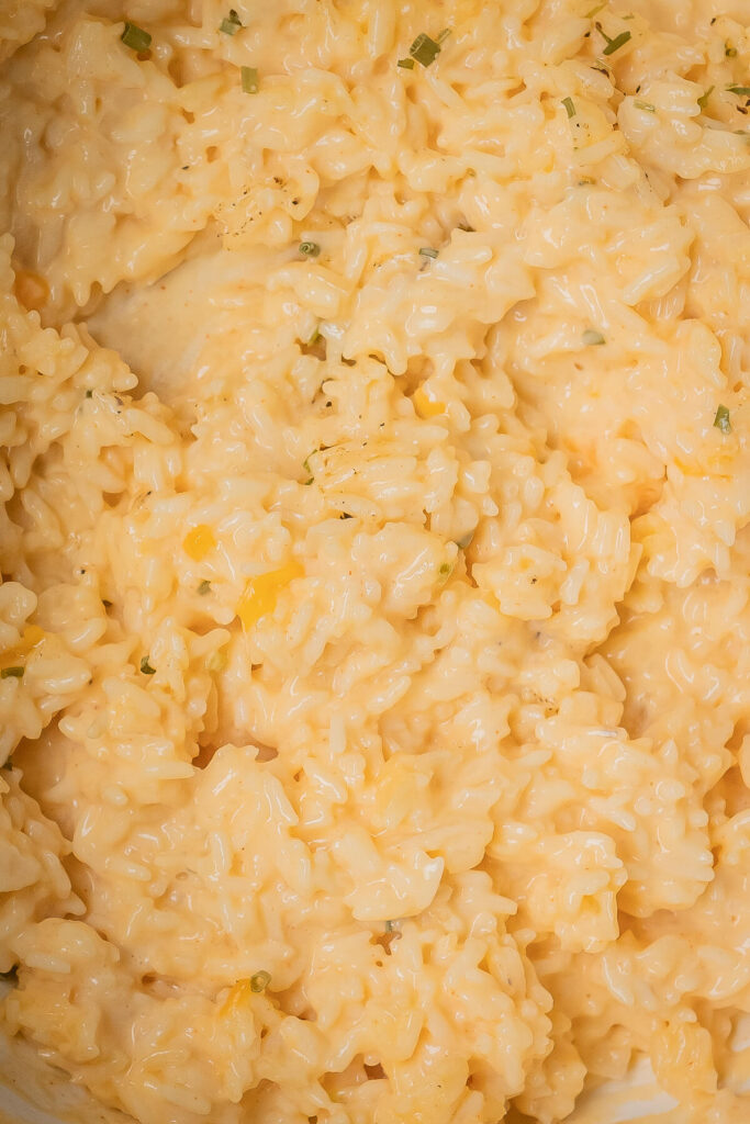 close up of a cheesy cheddar rice