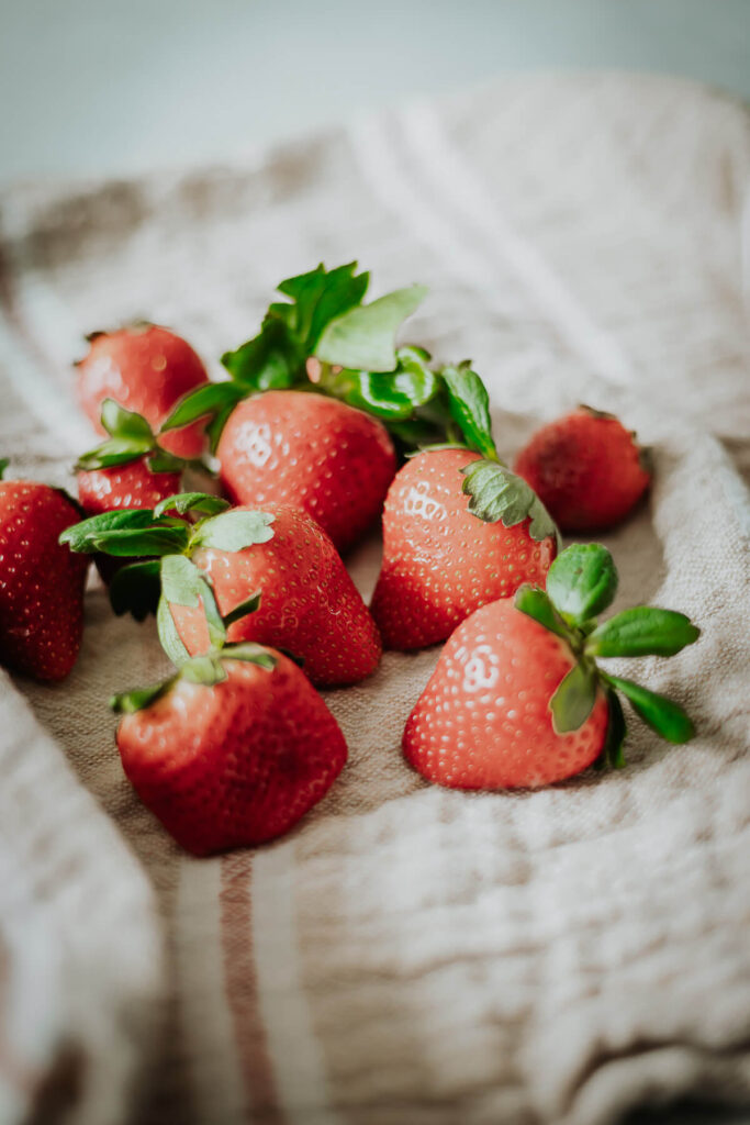 fresh strawberries on a clean tea towel