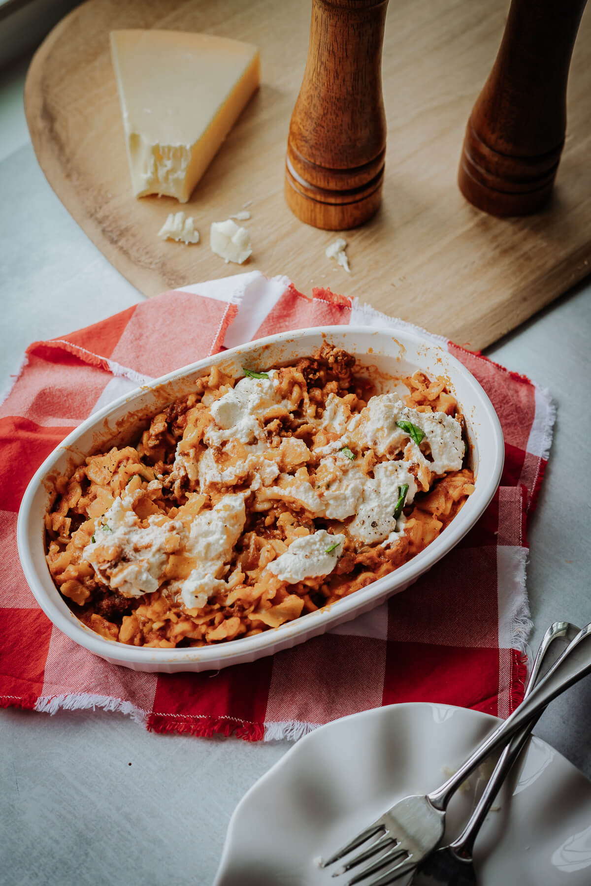 gluten free lasagna pasta on a table with a red and white gingham napkin