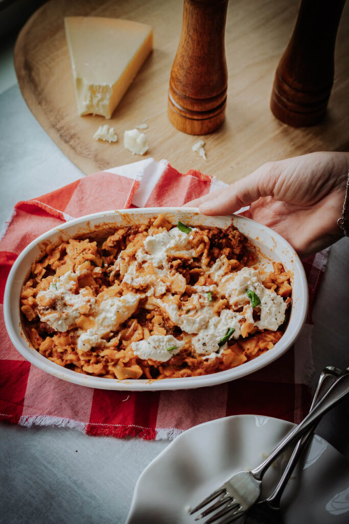 One pot lasagna pasta on a red and white gingham napkin